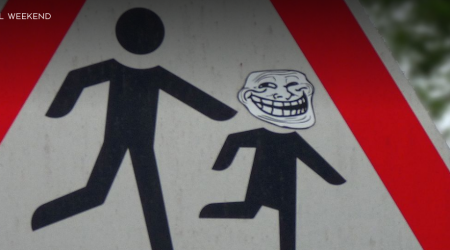 Roadsign with weird face superimposed over child