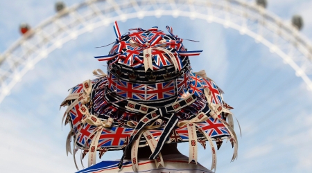 Person with union jacks on hat