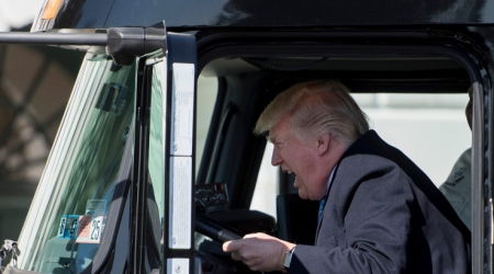 US President Donald Trump sits in the drivers seat of a semi-truck as he welcomes truckers and CEOs to the White House in Washington, DC, March 23, 2017, to discuss healthcare.